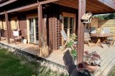 Casa in legno con porticato AURA (44+44 mm), 100 m² + 35 m² customer 3