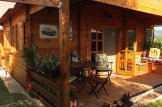 Casa in legno con porticato DONNA (44+44 mm), 63 m² + 11.5 m² customer 1