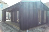 Casa in legno ANNA Modern (34 mm + rivestimento), 20 m² + 16 m² di porticato customer 3