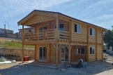 Casa in legno con porticato TOULOUSE (Coibentata, 44+44 mm), 100 m² + 20 m² customer 2