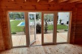 Ufficio in legno da giardino PREMIUM (Coibentata PLUS, 34 mm + rivestimento), 7x4 m, 28 m² customer 3